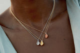Thread and Shell Necklace with Diamonds
